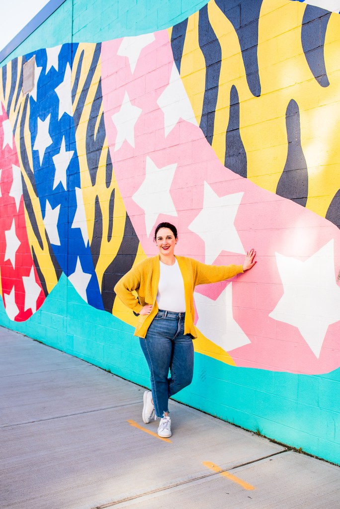 lady standing in front of tiger mural in ohio city